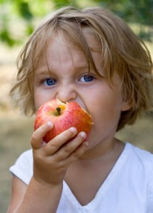 Child Eating Apple