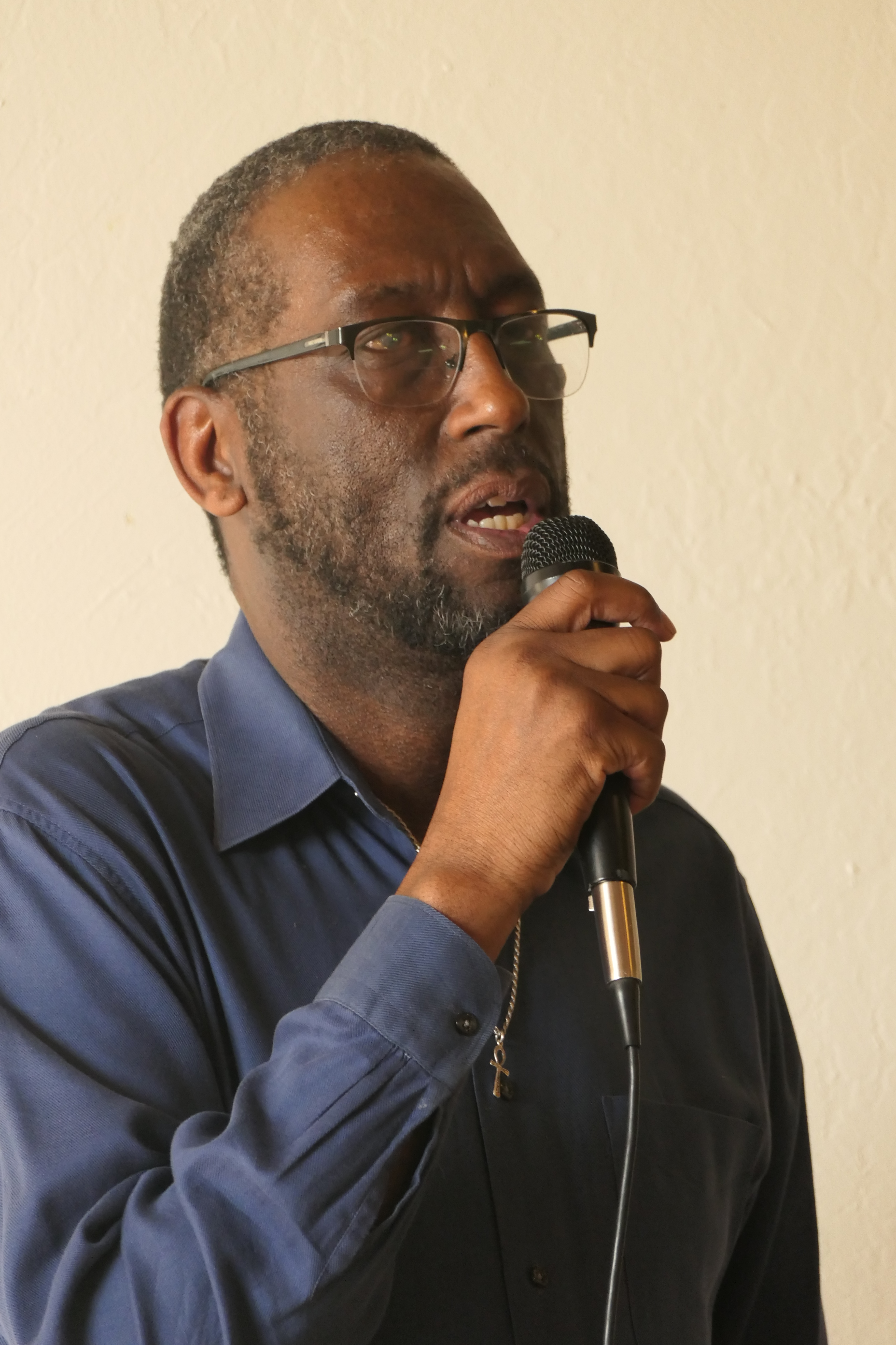 reverend speaking at speakers series graduation 