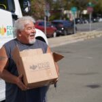 Client received box of food from Food Bank