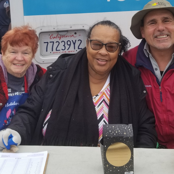 Sue, Pamela, and David at a distribution